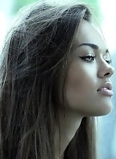 A seasoned grandmother unveils her breasts in an explosive display