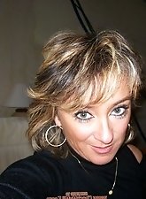 View my mature woman showing skin outdoors