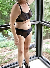 Extravagant experienced granny in her solo play