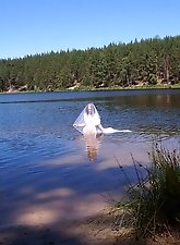 An older woman with perfect breast shape.