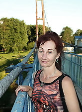 Staggering older businesswoman is covered with semen