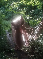 Old tart is posing undressed indoor