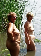 Superb older hellcat is taking off her dress for a photoshoot