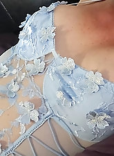 A skilled prostitute is pleasuring herself with her fingers