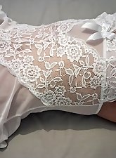 A pretty woman has sex in white underwear